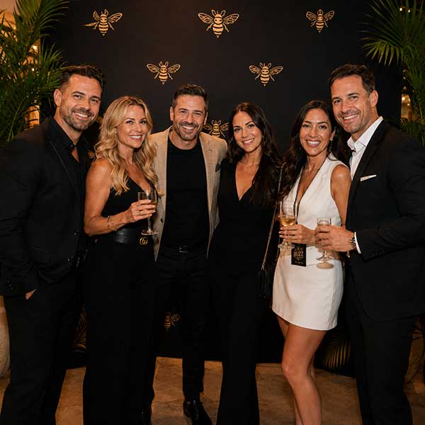 Buzz Club guests connecting at a South Florida social event